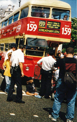 Rob and others blockading a bus while police approach them