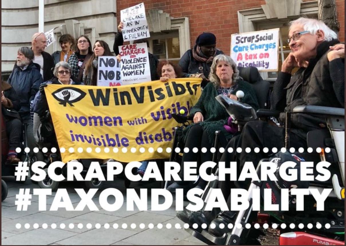A mixed picket of disabled women and men. Some of the women are holding WinVisible's banner. A placard says: Scrap Social Care charges -- a tax on disability.