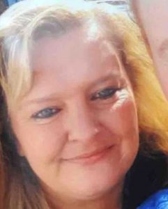 Jodey Whiting -- a woman with blue eyes and light brown hair is smiling.