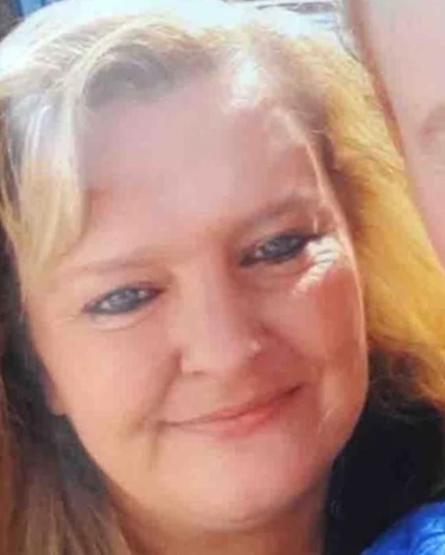 Jodey Whiting -- a woman with blue eyes and light brown hair is smiling.