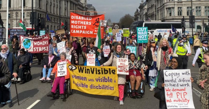 WinVisible, Disabled Mothers' Rights Campaign and Global Women's Strike marching along Parliament Square at the disability benefits protest, March 2025